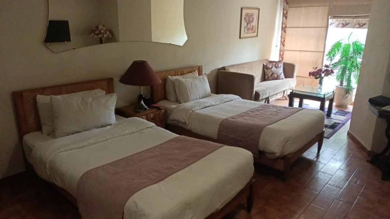 Maisonette Hotel & Apartments Лахор Экстерьер фото